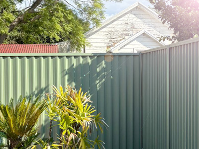 Sunlit steel fence